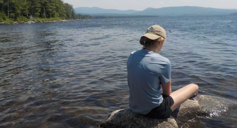 teen reflecting on canoeing course